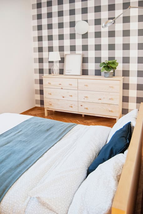 The chast of drawers in sleeping zone.