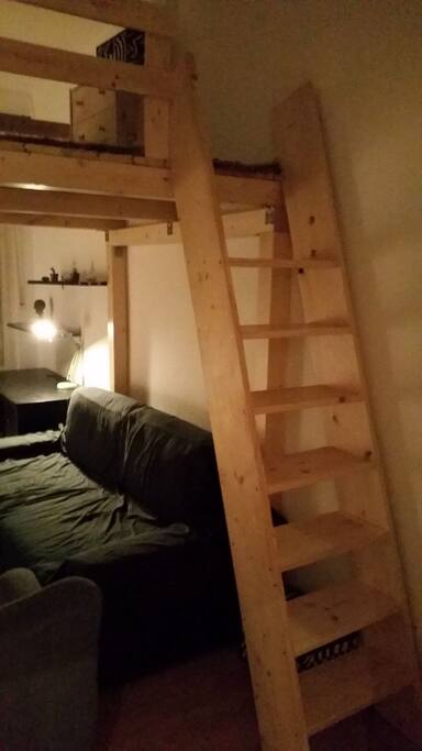 Living room with sleeper-sofa and gallery bed