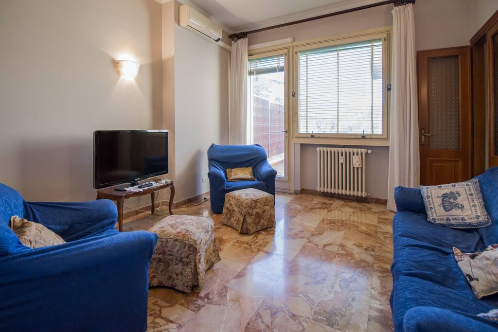 The lounge room with door window heading to one terrace