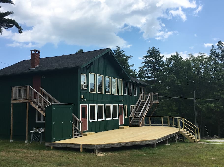 A large deck and a very spacious front lawn await you!