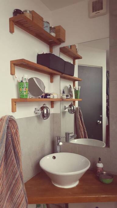 Bathroom with endless hot water and heated towel rail