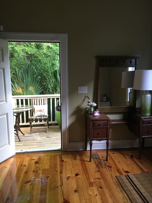 Lovely little porch off the master bedroom with table and chairs for morning cup of coffee.