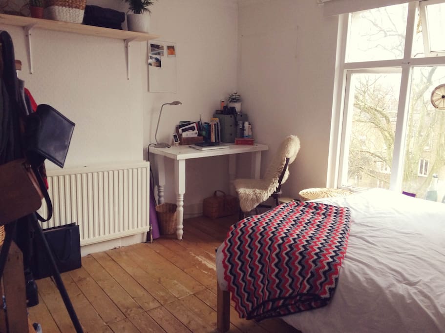 Desk / working space and clothes rail.