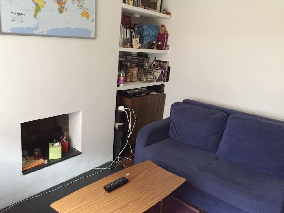 View of the living room and large sofa bed.