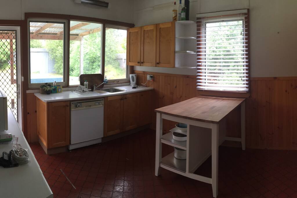 Cosy kitchen with dishwasher, oven, fridge, stovetop
