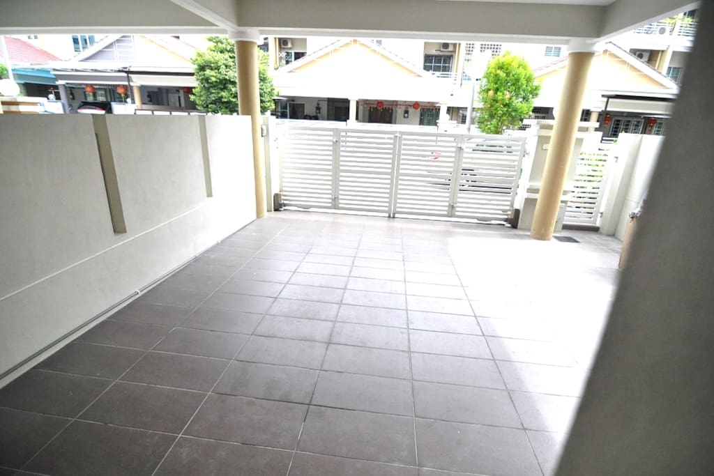 Roof covered car porch is sufficient for 2 cars, and the rest you may park outside of the gate as long as DO NOT block neighbour access. With auto gate and small gate at side.