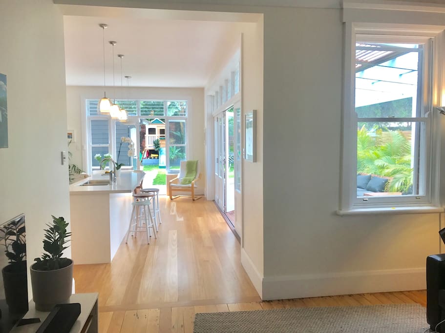 Kitchen with great outdoor access via bifolds to deck & French Doors to patio