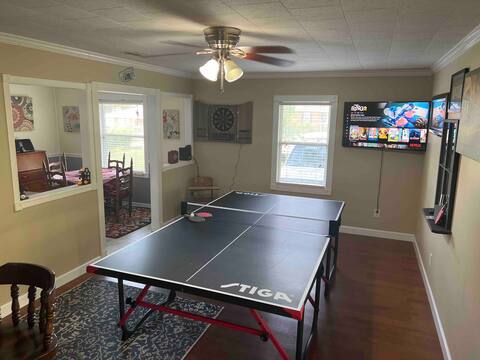 Comfy 3 bedroom house with hot tub and game room.
