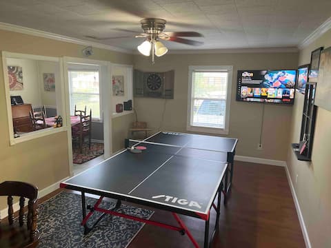 Comfy 3 bedroom house with hot tub and game room.