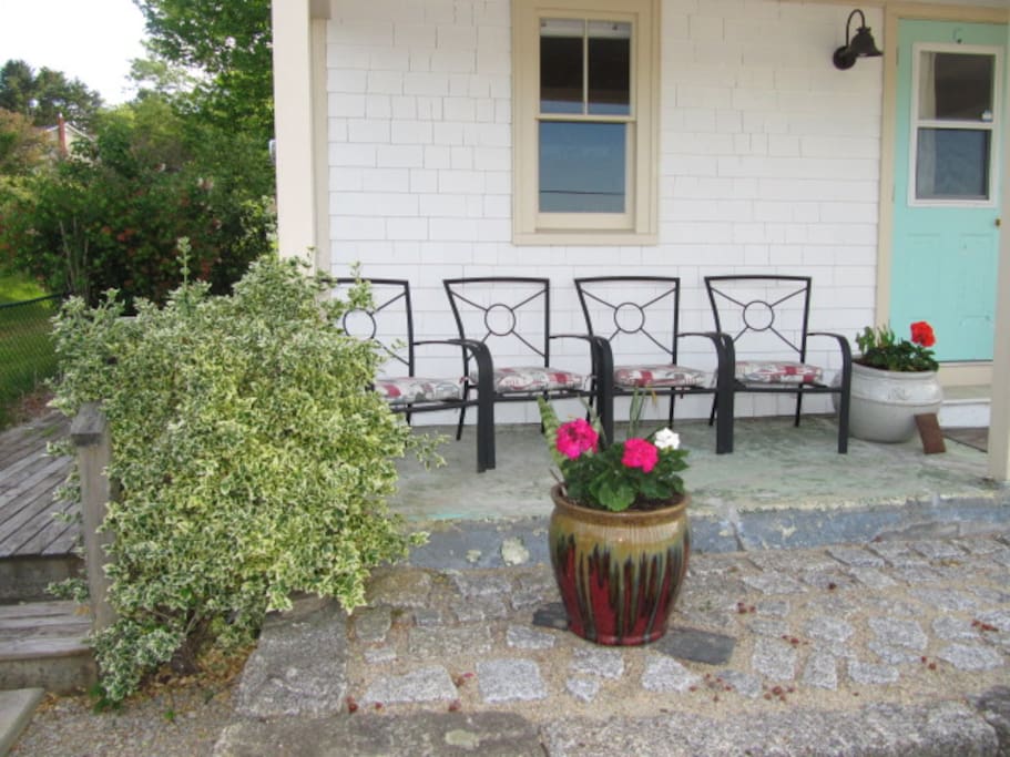 Relax on the verandah and watch the boats pass by.