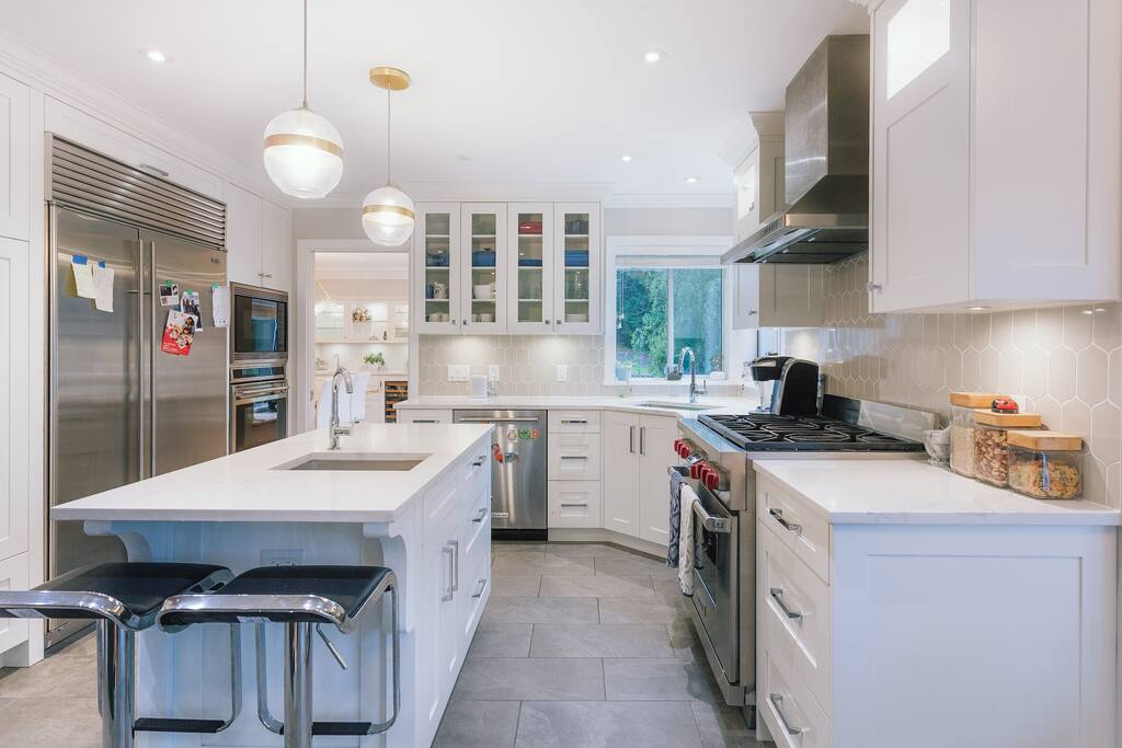 Kitchen w/ Sub-Zero fridge & 2 Wolf ovens