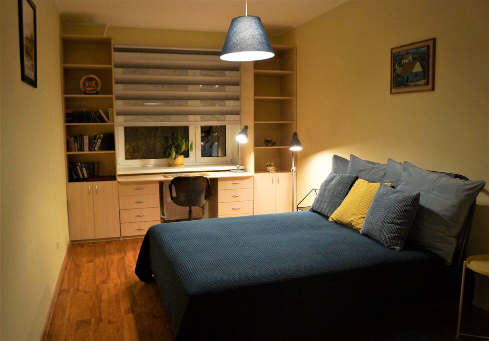 Bedroom with a double bed - night time