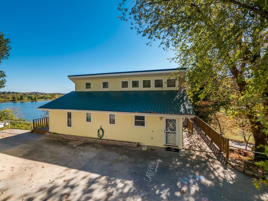 The parking area and the entrance to the house.