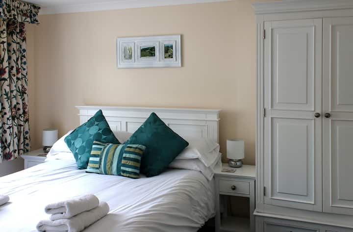 Light-filled master bedroom with en-suite