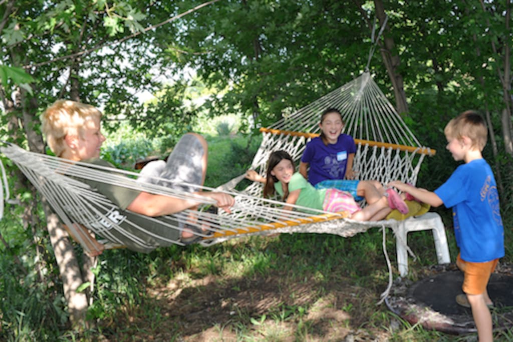Kids and kids at heart love chilling out on our hammocks.
