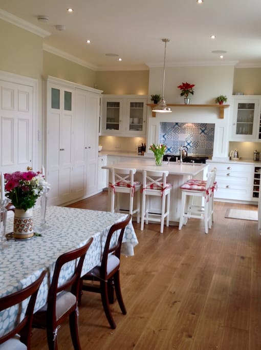 Kitchen/ Dining Room with Sonos speakers.