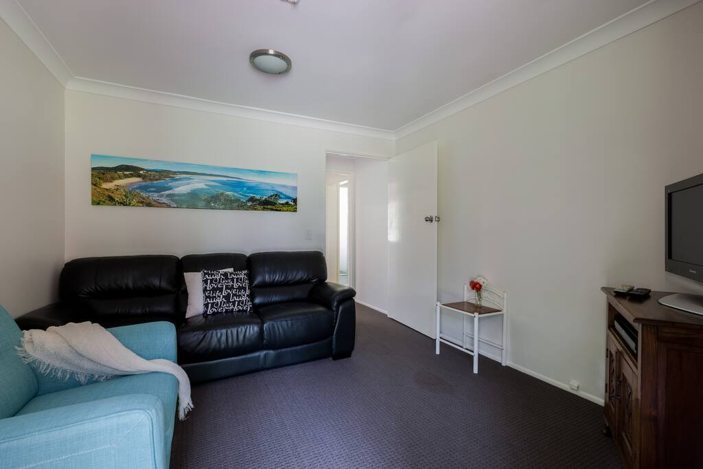 Settle into the comfy leather lounge to watch TV, Netflix and DVD's (all included)