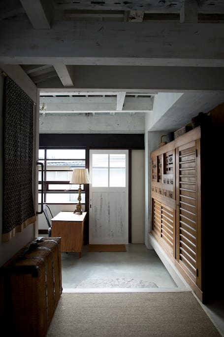 Reception area with impressive old Tansu cupboard .