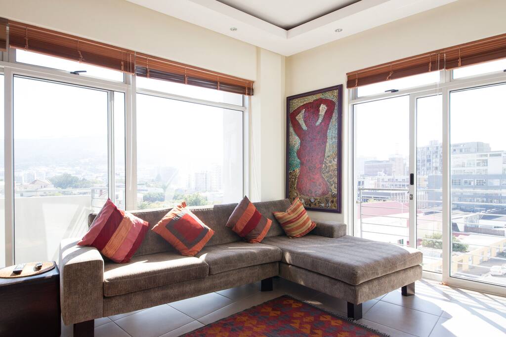 Living room with satellite TV and WiFi internet.