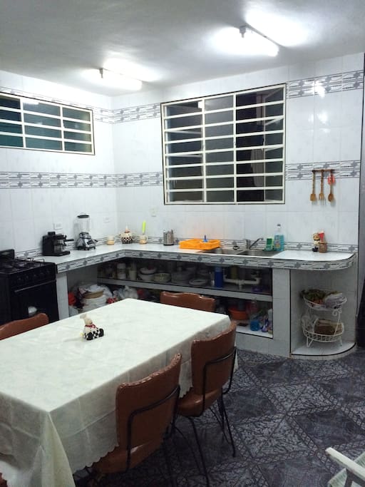 Common area. this is the house's kitchen and also the dinning room If you want to talk whit our family or prepare your dinner, we will be glad to share experiences whit you and... Cuban coffee... there are also a Refrigerator that you can use it.