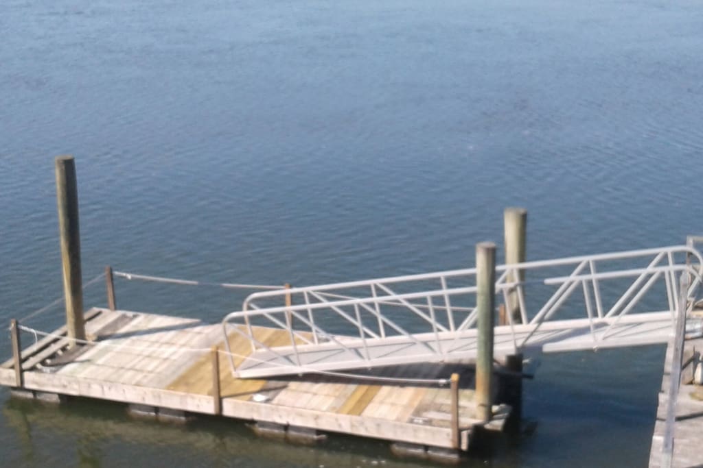 Boat dock with big float of the cottage.