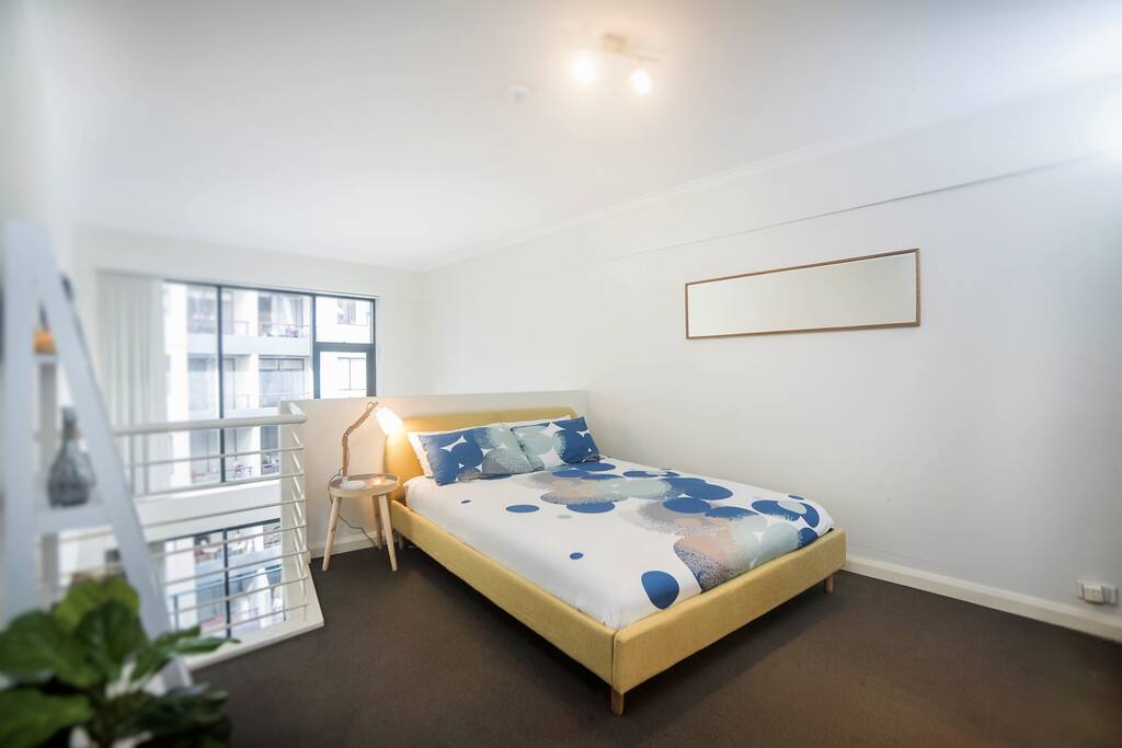 Loft bedroom that is open to living area below. Features ensuite & built in wardrobe