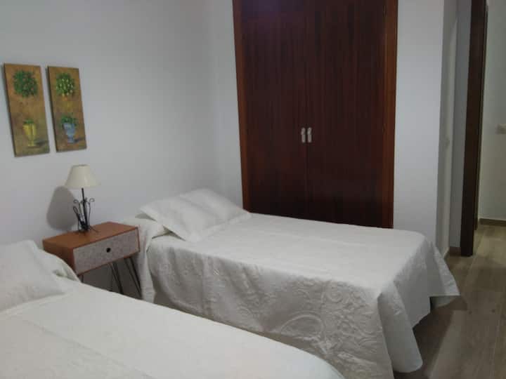 A double bedroom with built-in closet