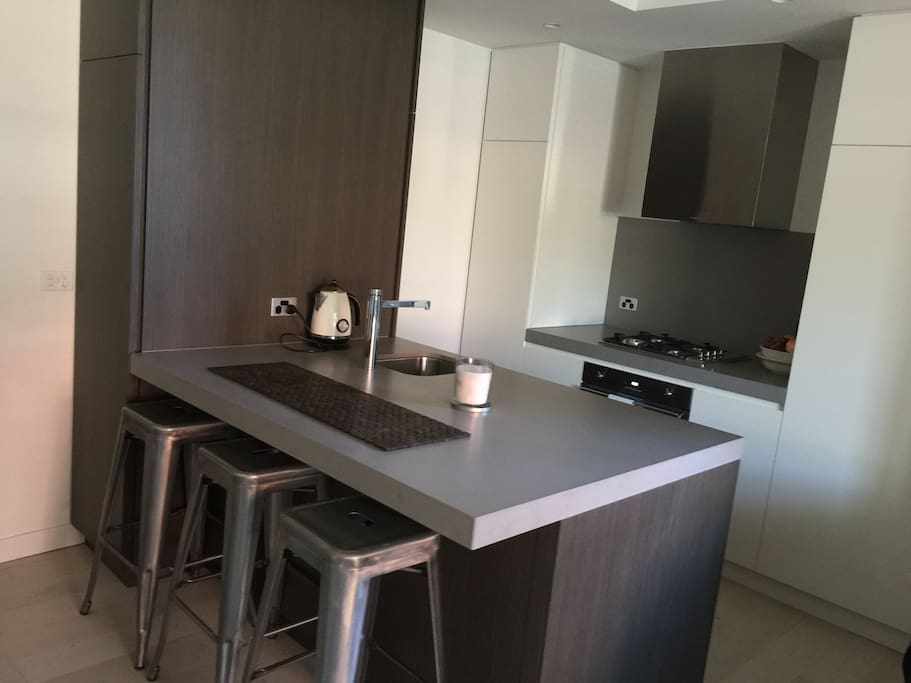 Stunning brand new, fully equipped kitchen with Smeg appliances and stone benches