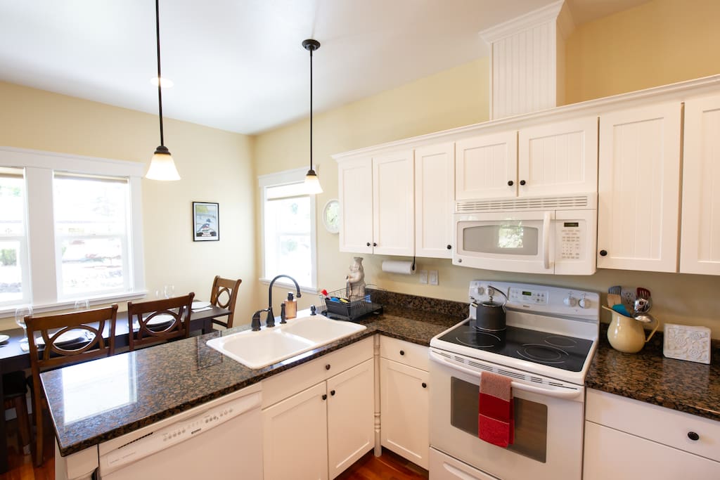 Fully stocked kitchen including dishwasher.