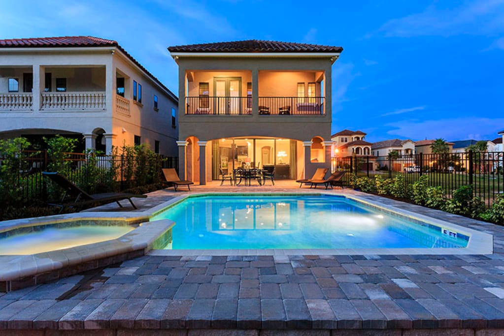 Relax in the beautiful pool any time of day or night