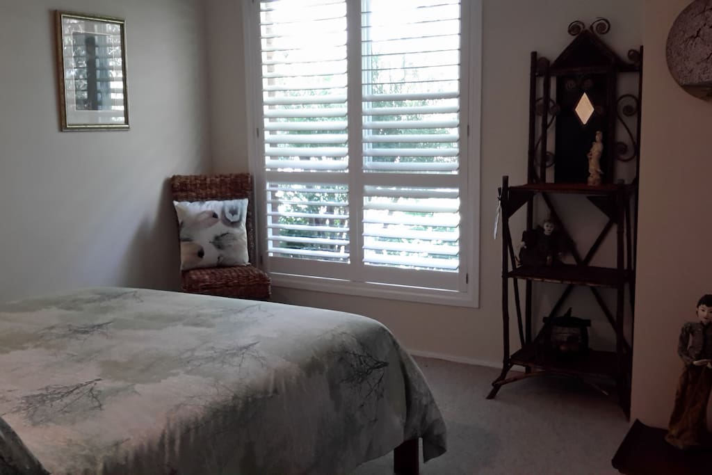 View of front bedroom, queen bed.