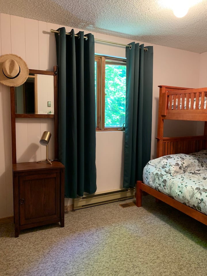 The third bedroom with bunk beds - lower double bed, upper single bed. Perfect for children's slumber parties! We've included a few small toys and a collections of children's books for our tiniest guests.
