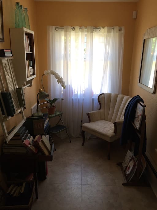 Quaint book nook right off the kitchen