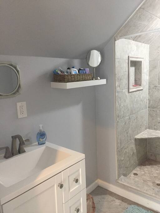 Bathroom stocked with basic amenities