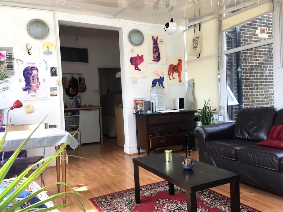 Spacious and bright living room with kitchen
