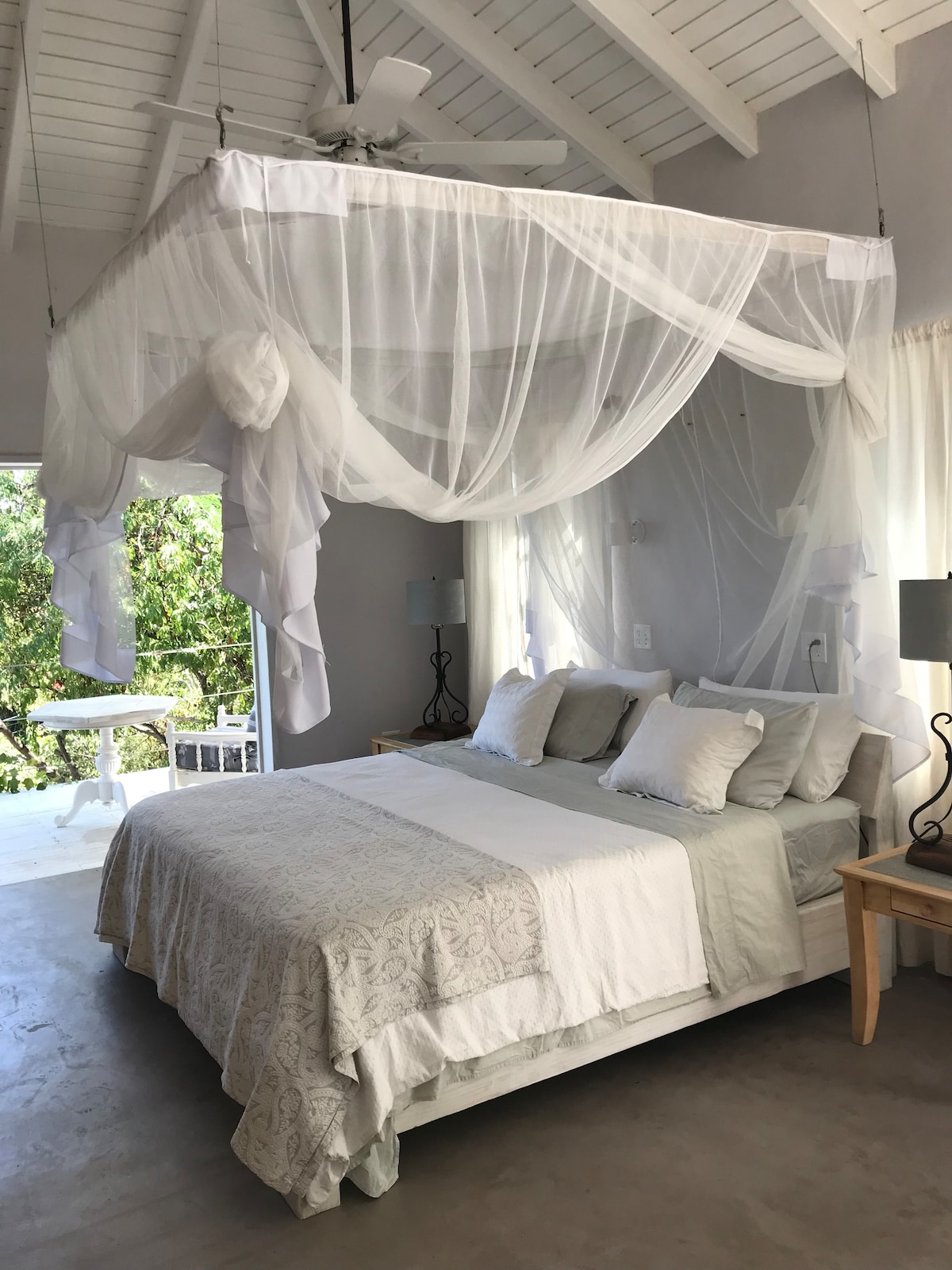 Master bedroom with new king size mosquito net recently  installed