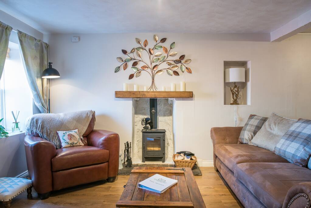 Cosy living room with wood burning fireplace