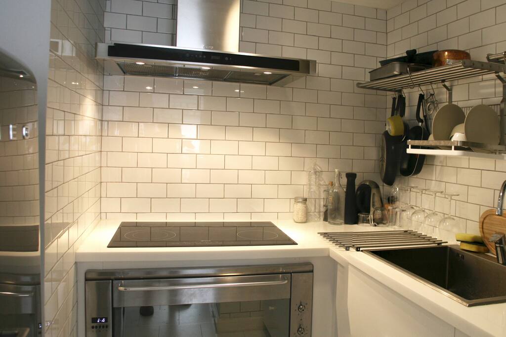 fully fitted kitchen with Smeg appliances, ready for home-cooking