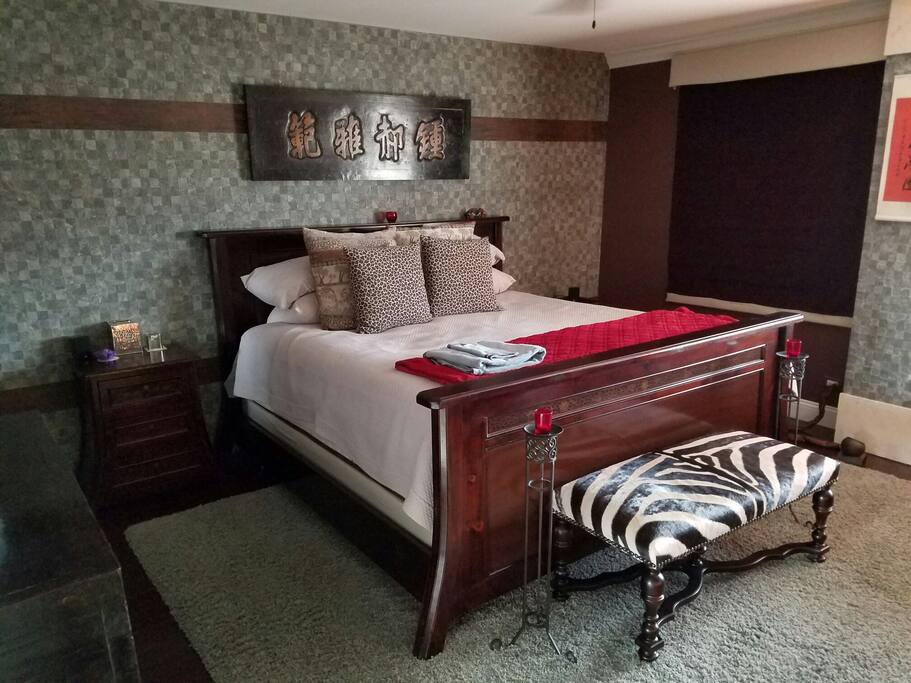 Master bedroom king bed. Big screen flat screen on facing wall.