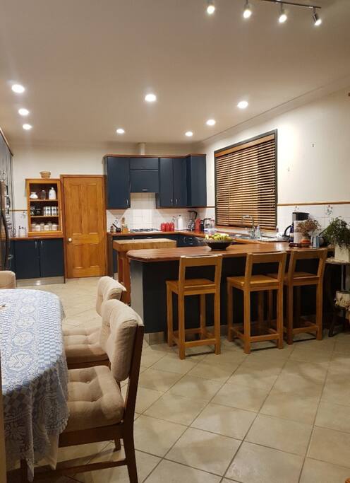 looking from lounge through dining and kitchen