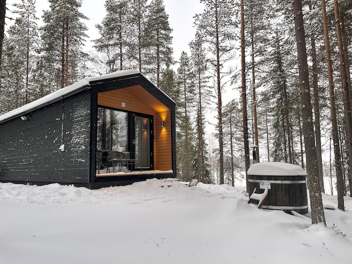 Luxury cabin with hot tub in the heart of Hossa