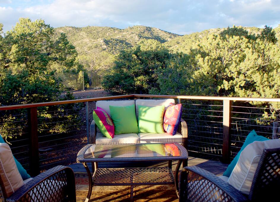 Enjoy happy hour on the north side of the deck and view the Sangre de Cristos