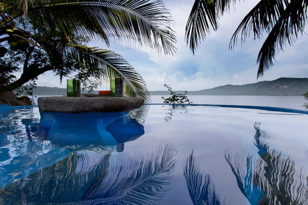 Infinity edge of the pool facing Laguna de Apoyo with seating.