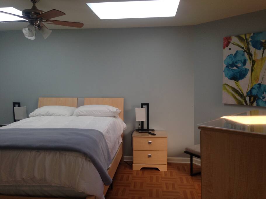 Enjoy comfortable high queen bed; two end tables, dresser