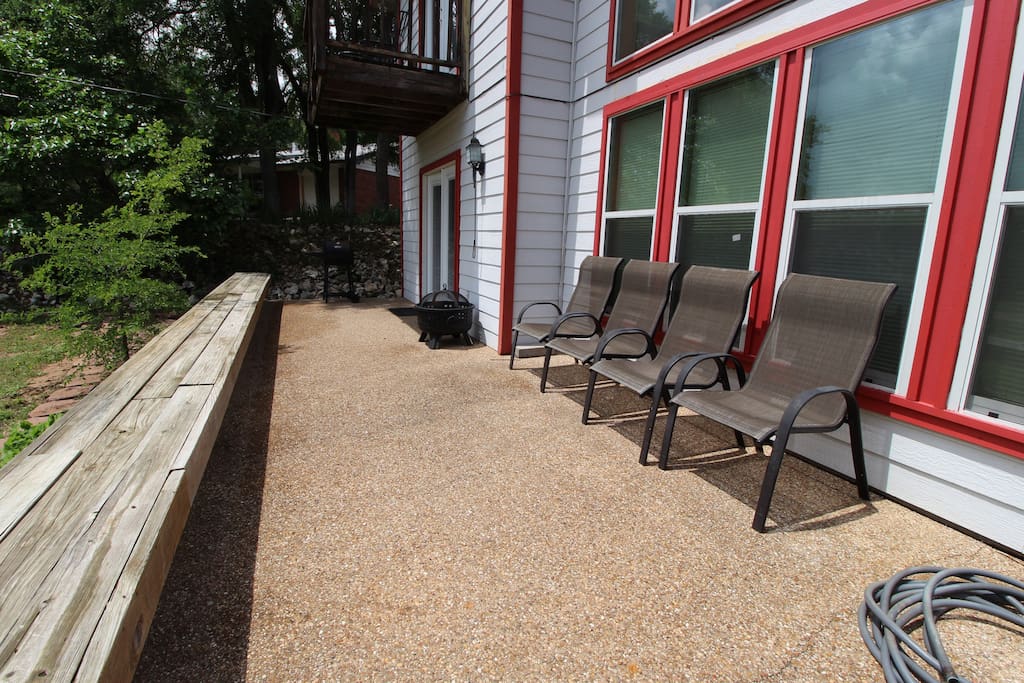 The lower level deck has a beautiful view of Lake Whitney and is conveniently located just off the kitchen. The lower patio has several chairs plus some built in seating as well as a charcoal grill.