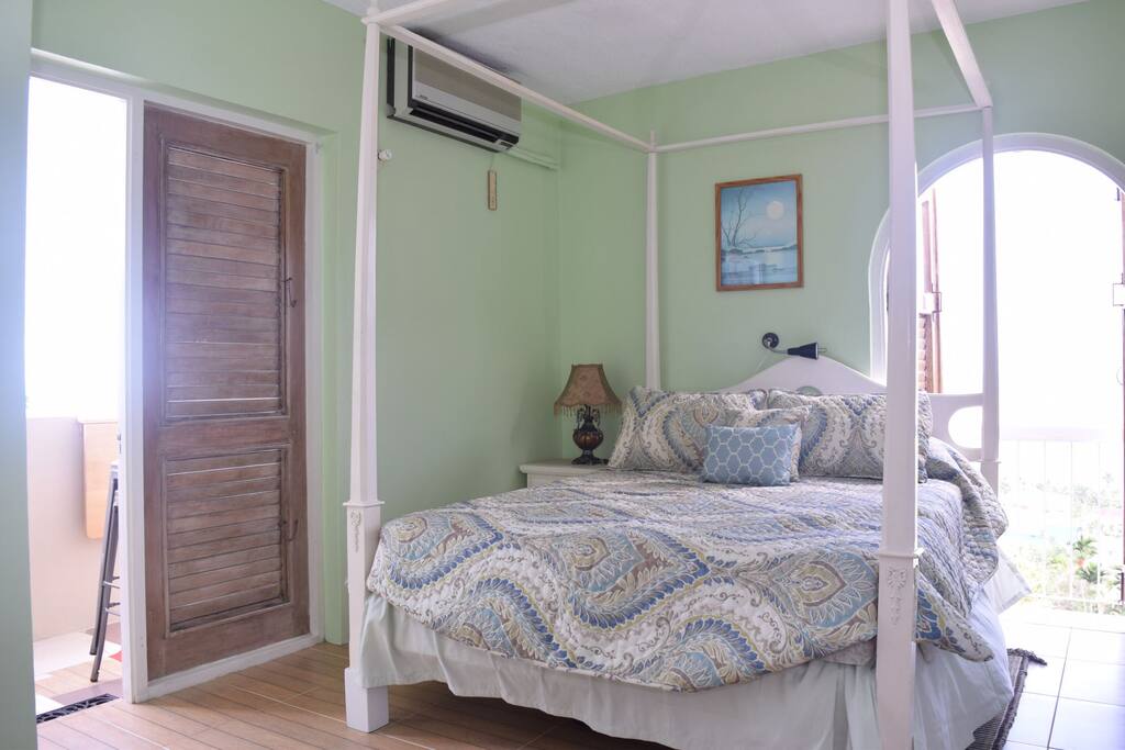 Master Bedroom with views of the city and ocean