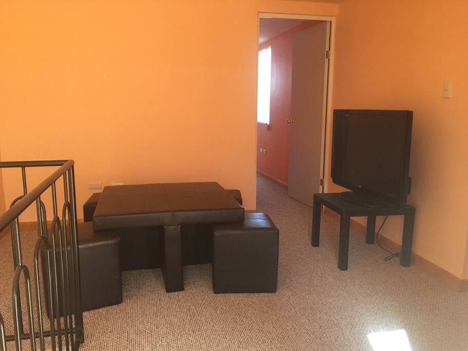 Estancia con TV segundo Piso