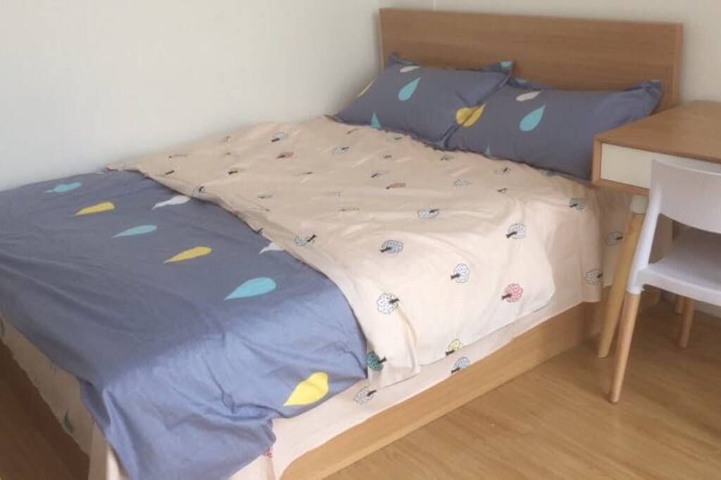 The smaller bedroom with a double bed