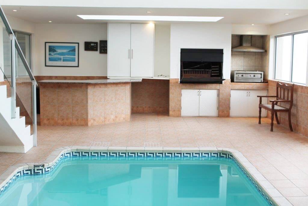 Indoor heated pool with indoor barbecue