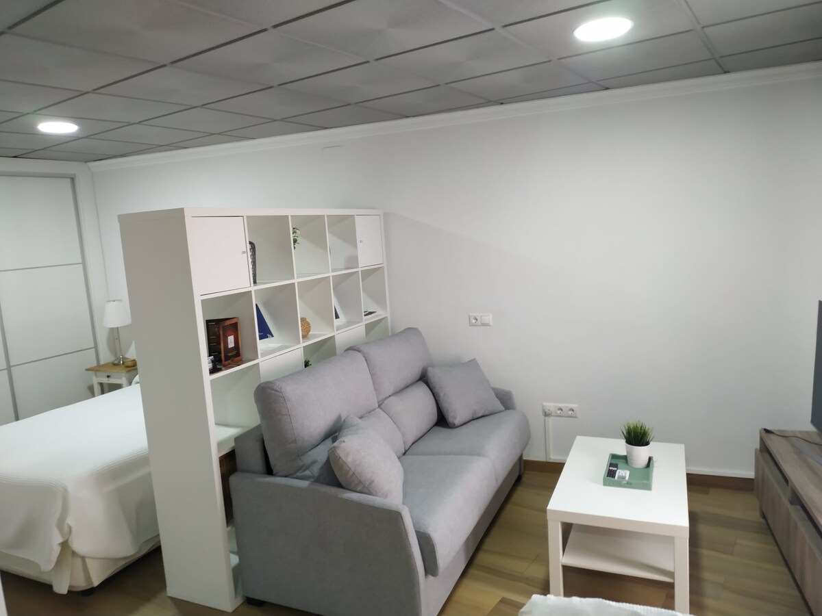 Salón con sofá cama